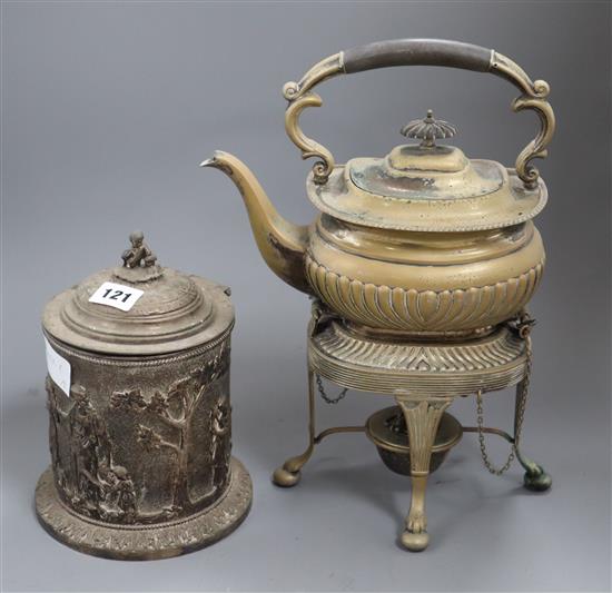 An electrotype plated biscuit barrel and a plated tea kettle on stand with burner.